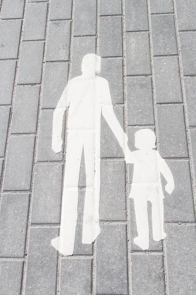 Silueta blanca caminando adulto y niño en baldosas — Foto de Stock