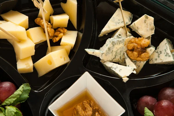 Different cheese with honey and walnut for party — Stock Photo, Image