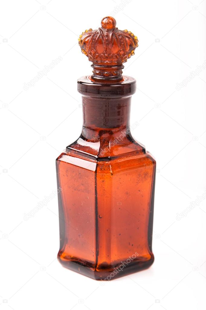 Glass brown retro bottle with stopper crown