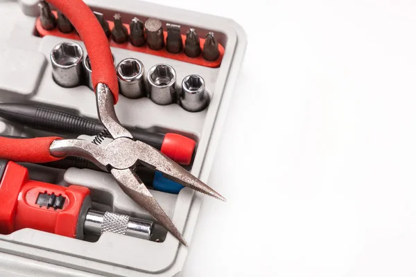 Open toolbox with screwdriver, heads and bit — Stock Photo, Image