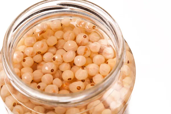 Garden white currant in juice on top glass can — Stock Photo, Image