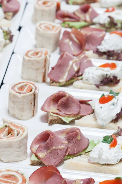 Buffet with snacks from fish and meat Stock Image