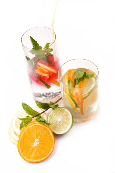 Fresh cold cocktail in glass with sliced citus — Stock Photo, Image