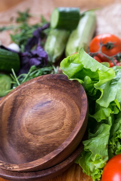 Background from mixed vegetables with wood bowl — Stock Photo, Image