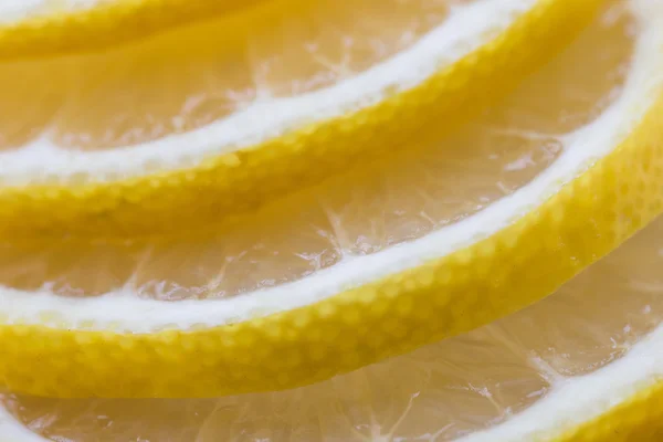 Círculo en rodajas de limón fresco en forma de pie de página — Foto de Stock