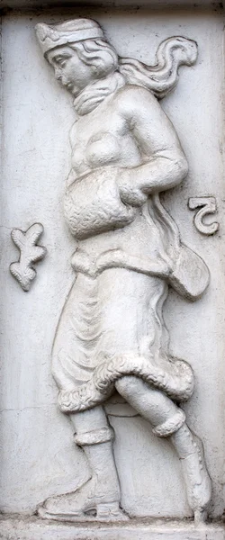 Old vintage bas-relief with woman Stock Image