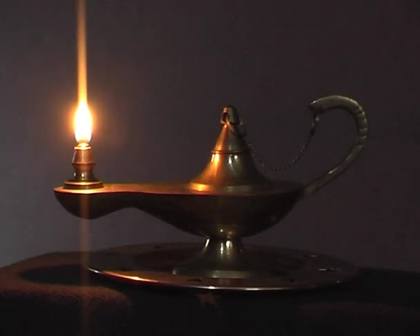 Old antique magic lamp burning — Stock Video