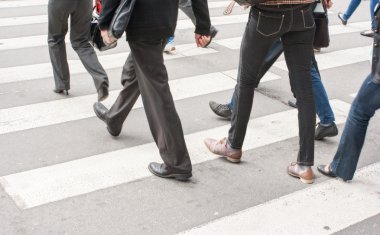 legs of pedestrians in a crosswalk clipart