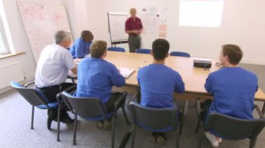 mavi yakalı işçilerin bir toplantı ya da Eğitim Semineri