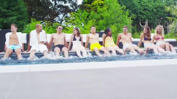 Mixed ethnicity friends enjoying pool party — Stock Video