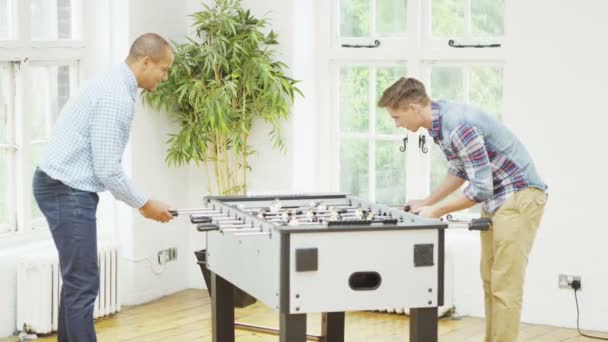 Friends playing game of table football — Stock Video