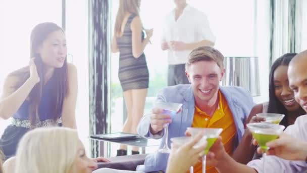 Friends laughing & enjoying cocktails — Stock Video