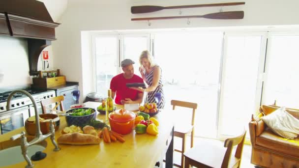 Couple with computer tablet. — Stock Video