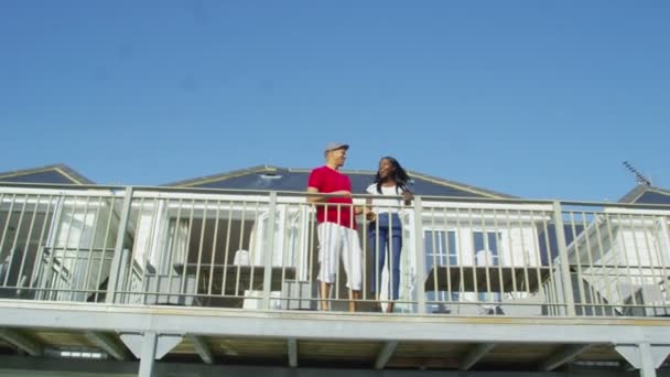 Couple on vacation go out on balcony — Stock Video