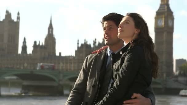 Man and woman standing together in London — Stock Video