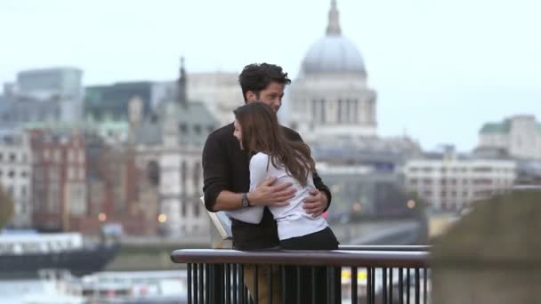 Attractive couple embrace on balcony — Stock Video