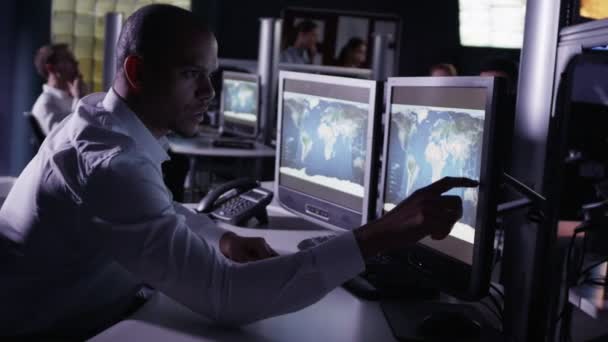 Security personnel watching the screens — Stock Video