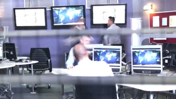 Security personnel watching the screens — Stock Video