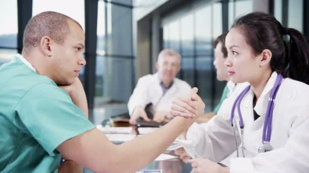 Bored doctor and nurse in meeting — Stock Video