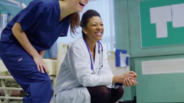 Cute and affectionate little girl in hospital takes steps towards the doctor — Stock Video