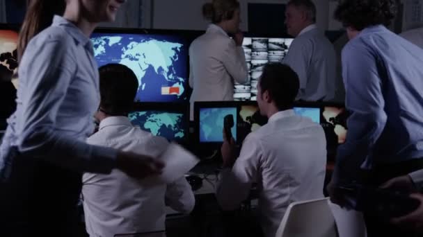 Male security personnel in system control room — Stock Video