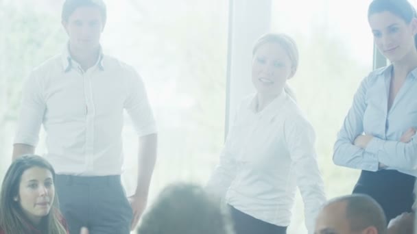 Business team sitting in comfortable chairs — Stock Video