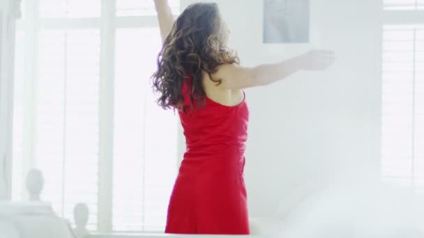 Brunette in red evening gown dances — Stock Video