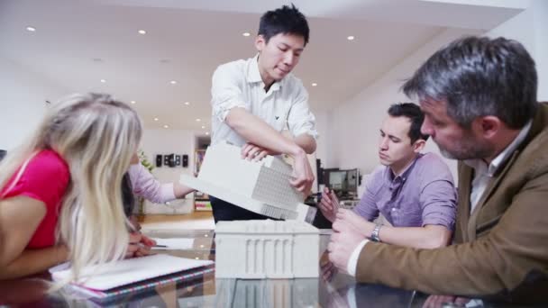 Dynamic young architects in a business meeting — Stock Video