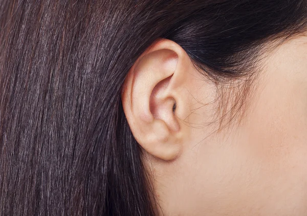 Young woman ear closeup