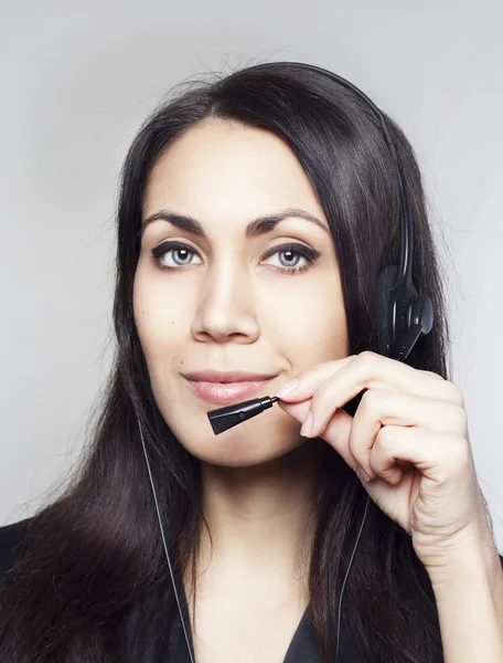 Operatore donna con auricolare — Foto Stock