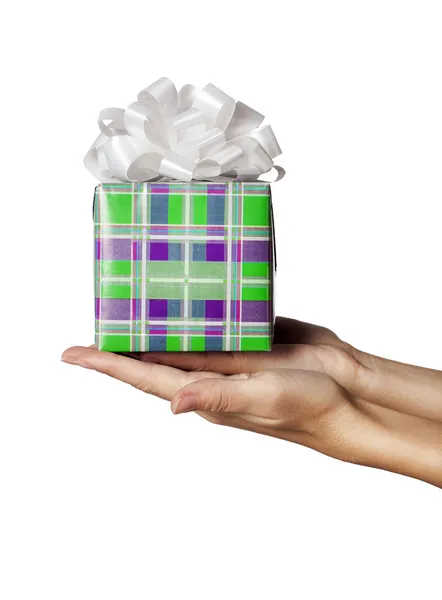 Hands holding present gift — Stock Photo, Image