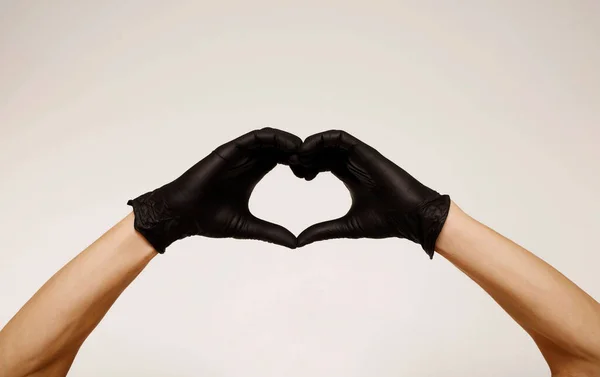 Close Man Hands Black Protective Gloves Making Heart Sign Hands — Stock Photo, Image