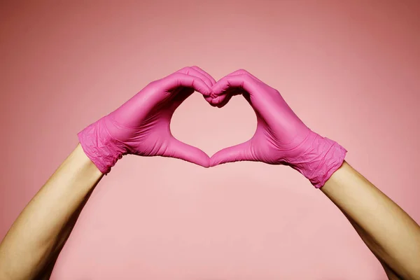 Close Man Hands Pink Protective Gloves Making Heart Sign Hands — Stock Photo, Image