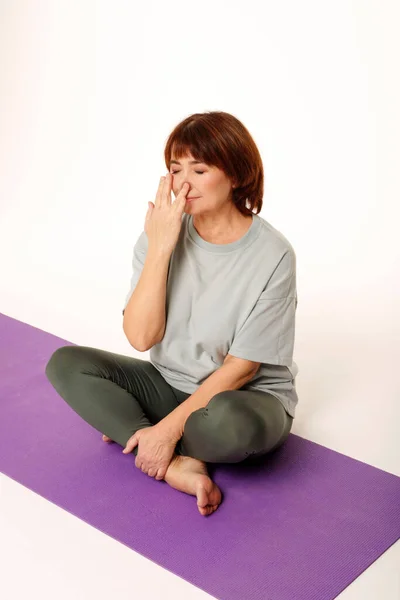 Middle Aged Yogi Attractive Woman Practicing Yoga Concept Making Alternate Imagem De Stock