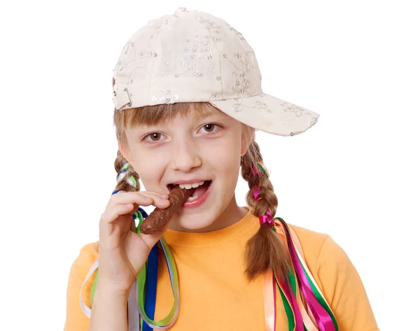 Teen eating chocolate — Stock Photo, Image