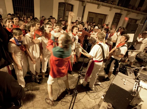 PAMPLONA, SPAIN-JULY 9: Young are having fun with the mus