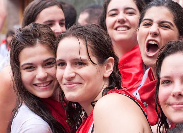 PAMPLONA, SPAIN -JULY 6: Young women are having fun at the openi — Stock Photo, Image