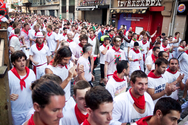 PAMPLONA, SPAIN - JULY 8: People await start of race of bulls at