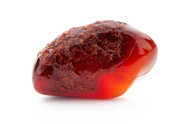 Natural amber. A piece of yellow opaque natural amber on white background. — Stock Photo, Image
