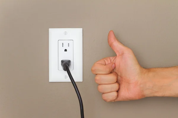 Thumbs up and Electric cable — Stock Photo, Image