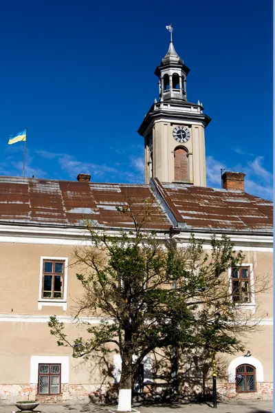 Historic building with tower and clock — Stock Photo, Image