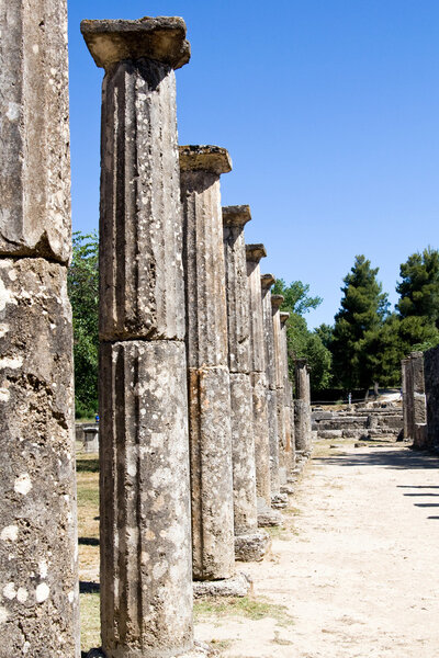 Ancient columns and ruins in Olympia, Greece