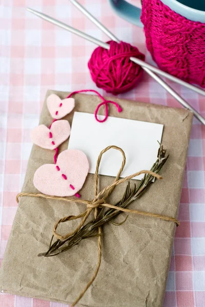 Old notebook with a dry branch of rosemary for love notes — Stock Photo, Image