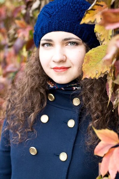 Portrait of young beautiful brunette in blue beret — Stock Photo, Image