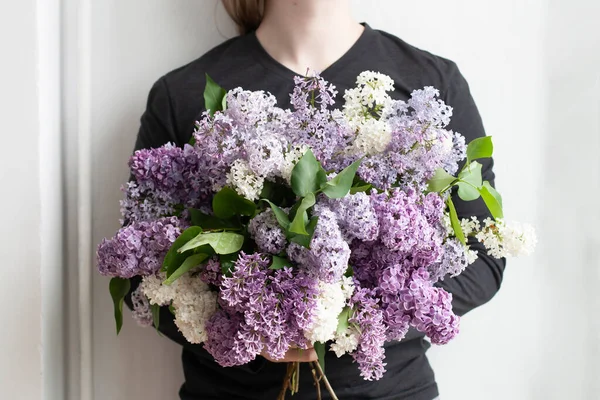 Young Handsome Guy Holding Huge Bouquet Colorful Lilacs — Zdjęcie stockowe