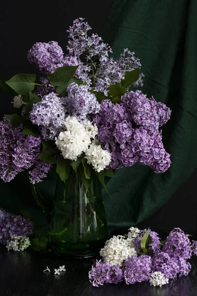 Fragrant Bouquet Colorful Lilacs Stands Green Glass Vase Black Background — Photo