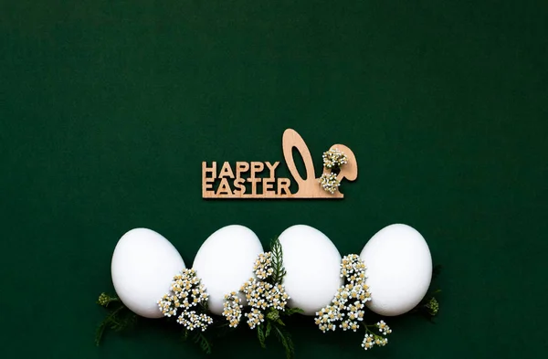 Festive Easter White Eggs White Small Flowers Green Background Nearby — Stok fotoğraf