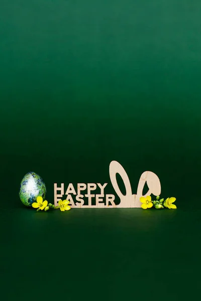 Wooden Inscription Happy Easter Stylized Bunny Ears Dark Green Background — Stockfoto