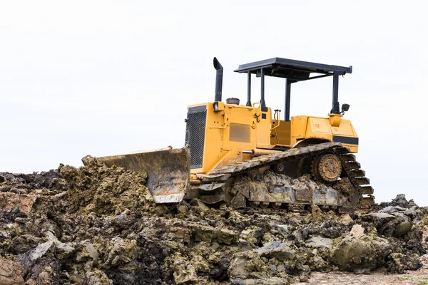 Bulldozer i byggarbetsplatsen — Stockfoto