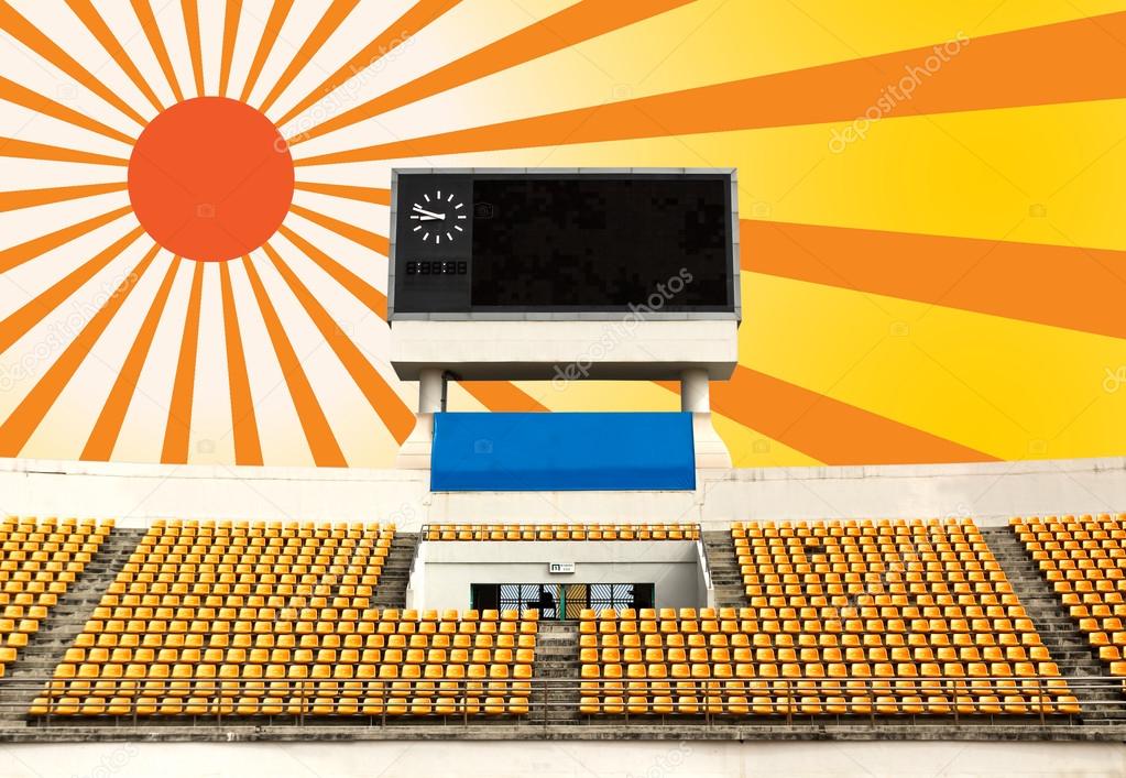 Stadium with scoreboard and sun ray